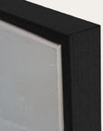 close-up of a black frame corner with a white background 