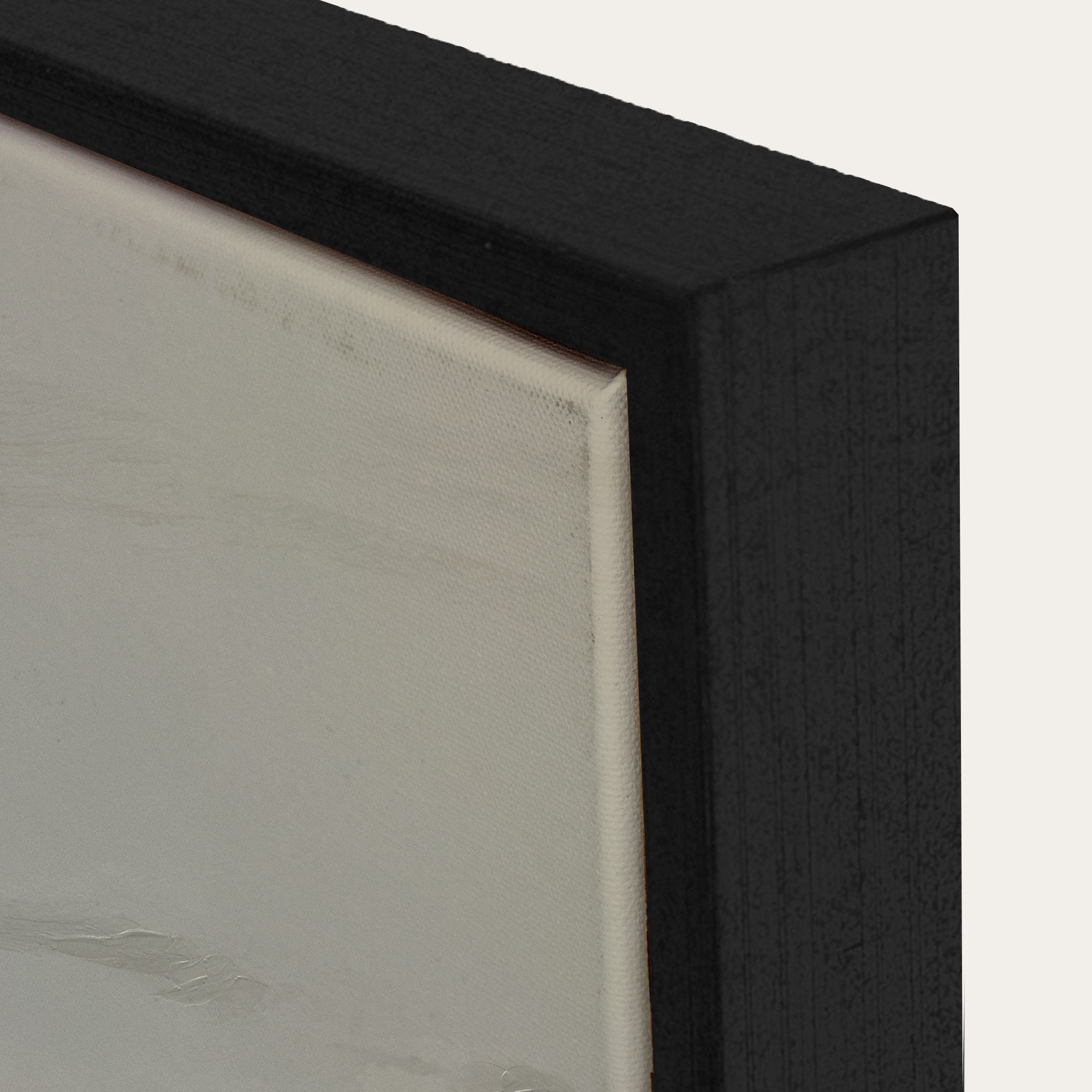 Close-up of a black picture frame corner with a white background 