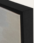 close-up of a black frame corner with a light-colored interior. 