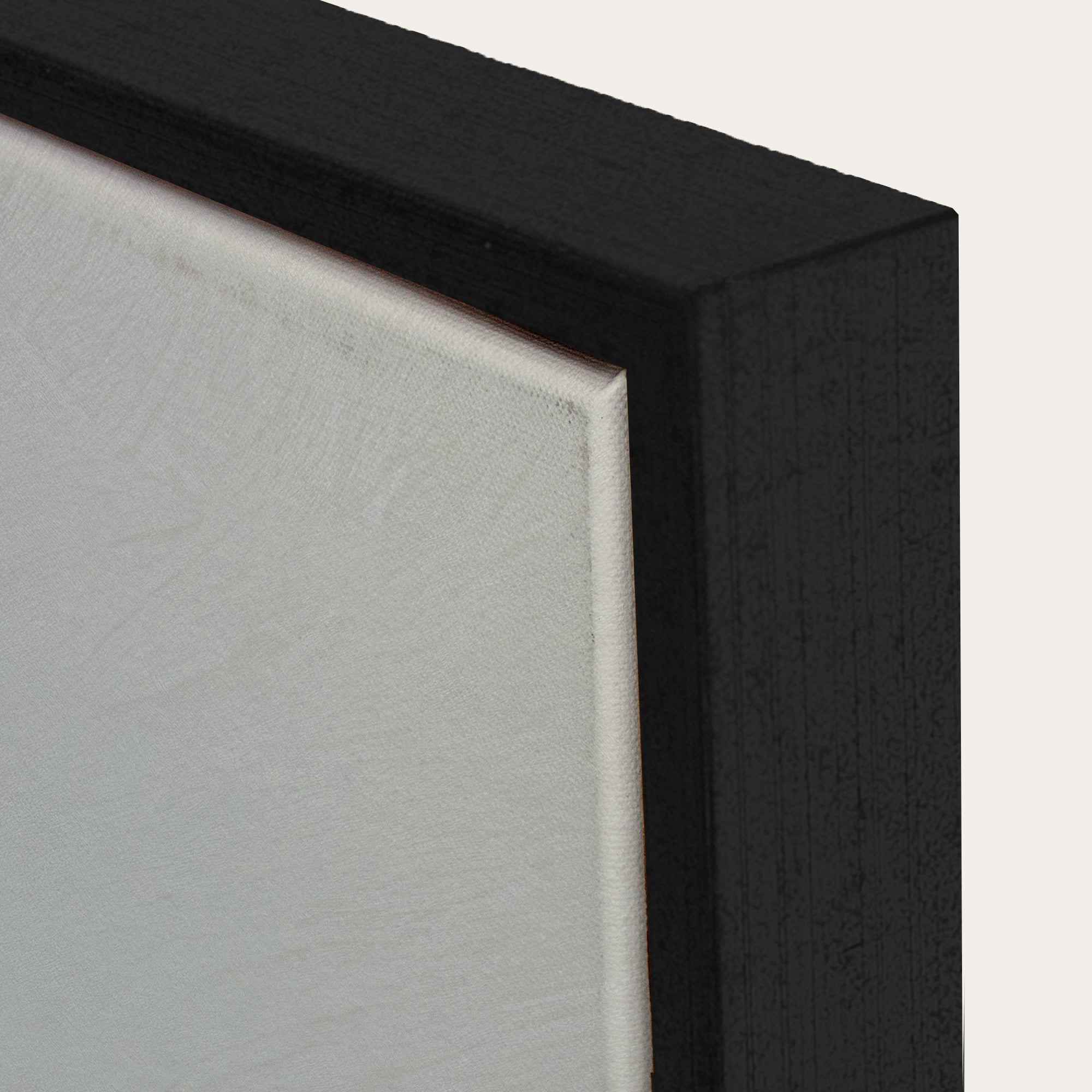 Close-up of a black frame corner with a white background 