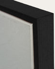 close-up of a black frame corner with a white background 