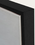 close-up of a black frame corner with a white background 