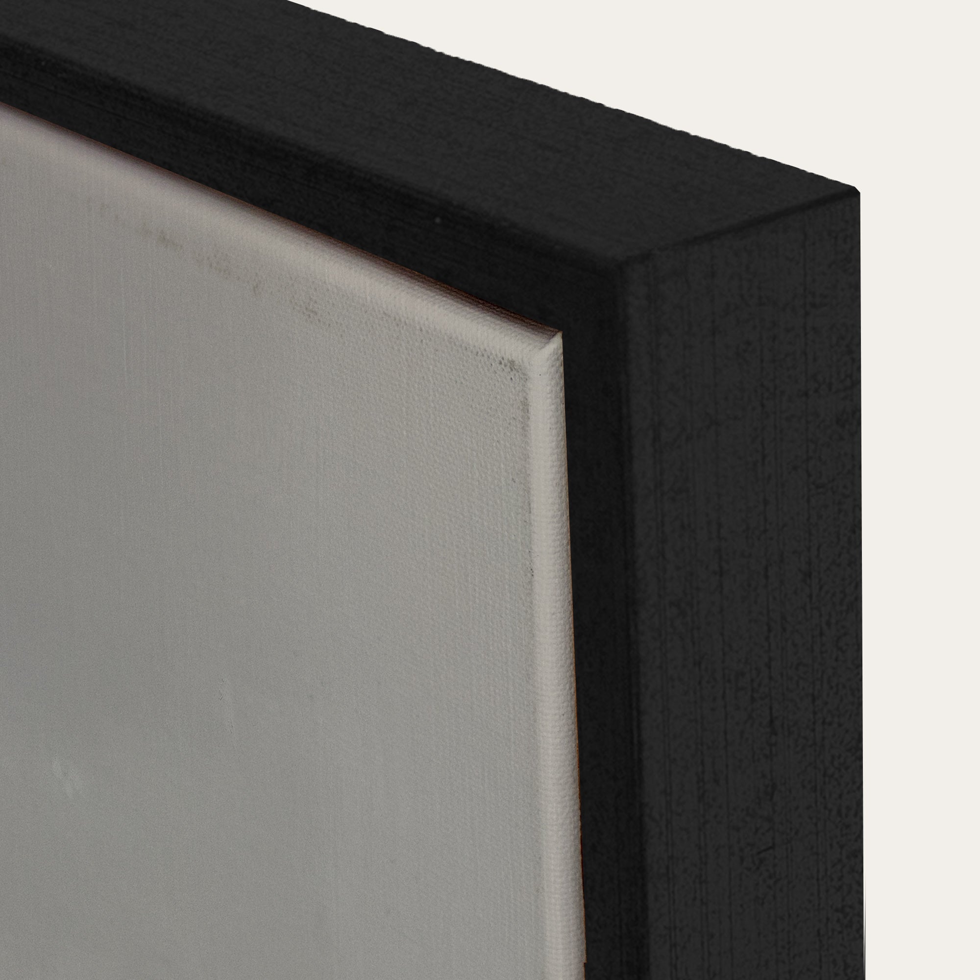 Close-up of a black picture frame corner with a white background 