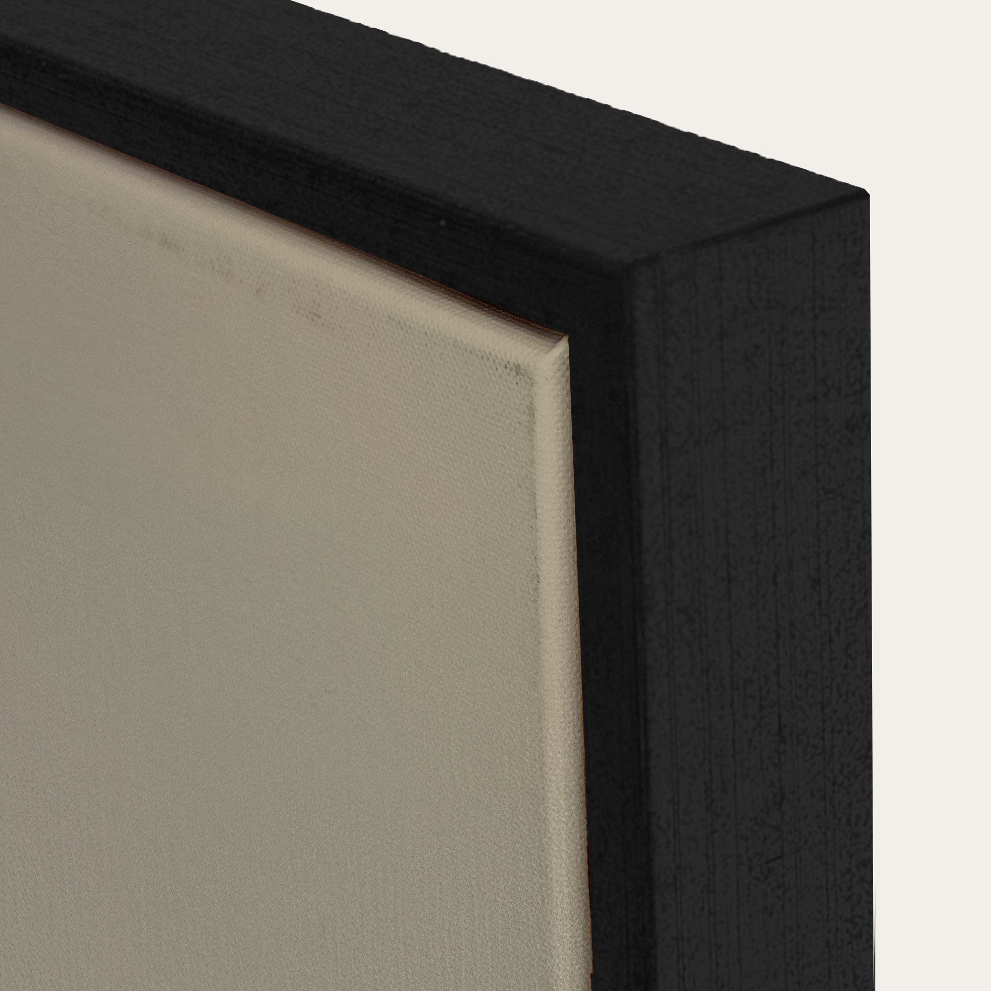 Close-up of a black frame corner with a neutral background 