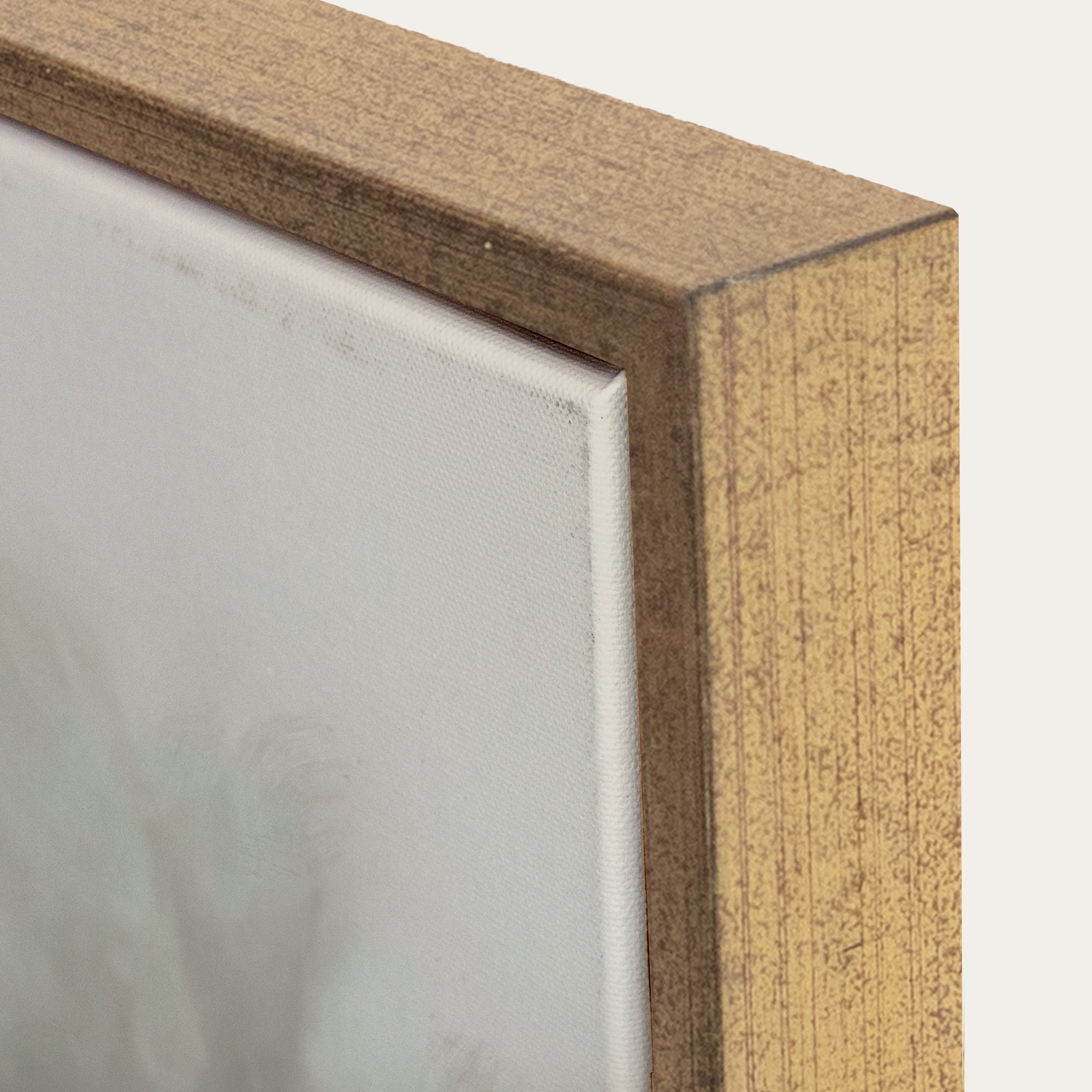 Close-up of a wooden frame corner with a neutral background. 