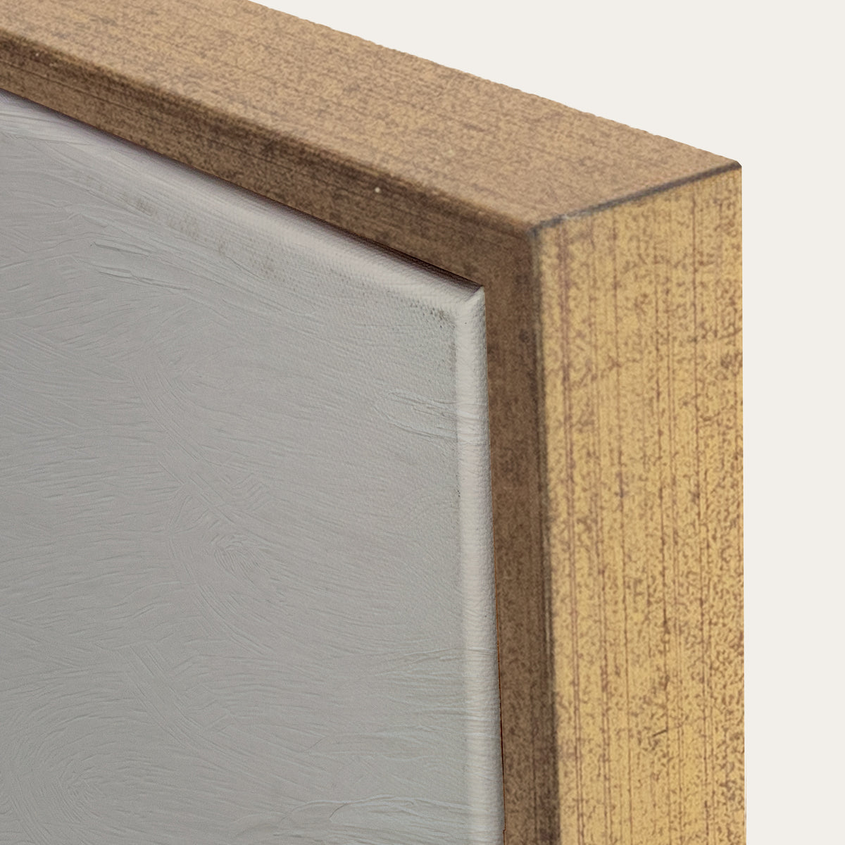 Close-up of a wooden frame corner with a neutral background 