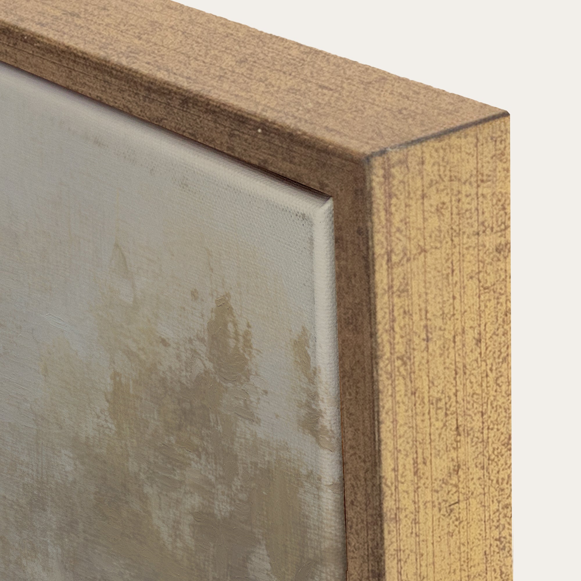 Close-up of a wooden picture frame corner with a textured surface. 