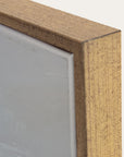 close-up of a wooden frame corner with a neutral background 