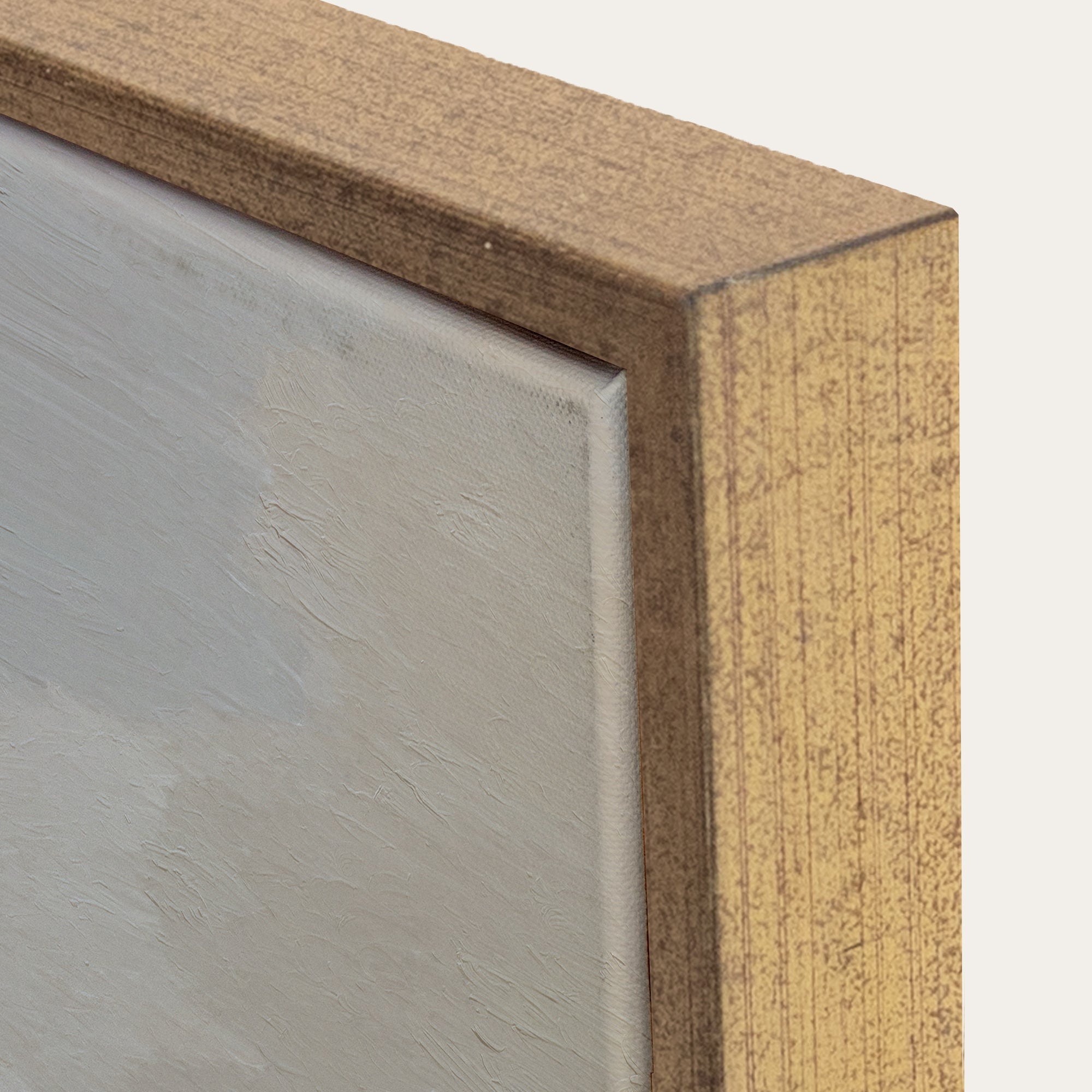 Close-up of a wooden frame corner with a neutral background 