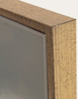 close-up of a wooden frame corner with glass 