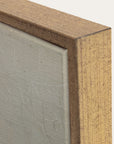 close-up of a wooden frame corner with a textured gray surface inside 