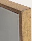 close-up of a wooden frame corner with a neutral background 