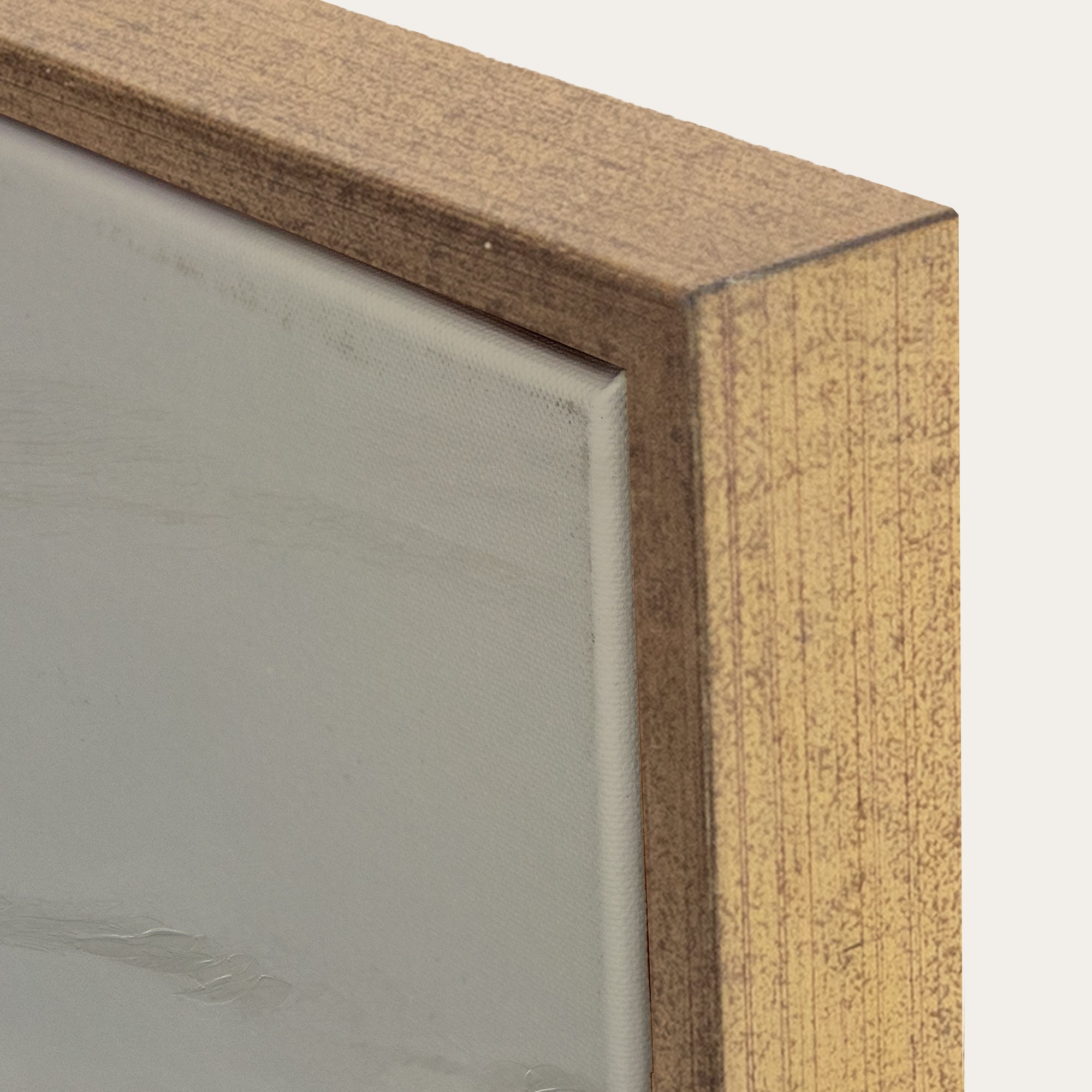 Close-up of a wooden frame corner with a neutral background 