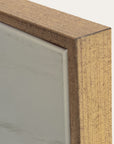 close-up of a wooden frame corner with a neutral background 