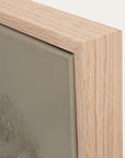 close-up of a wooden frame corner with a textured green background 