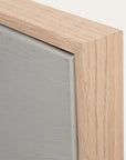 close-up of a wooden frame with a gray interior 