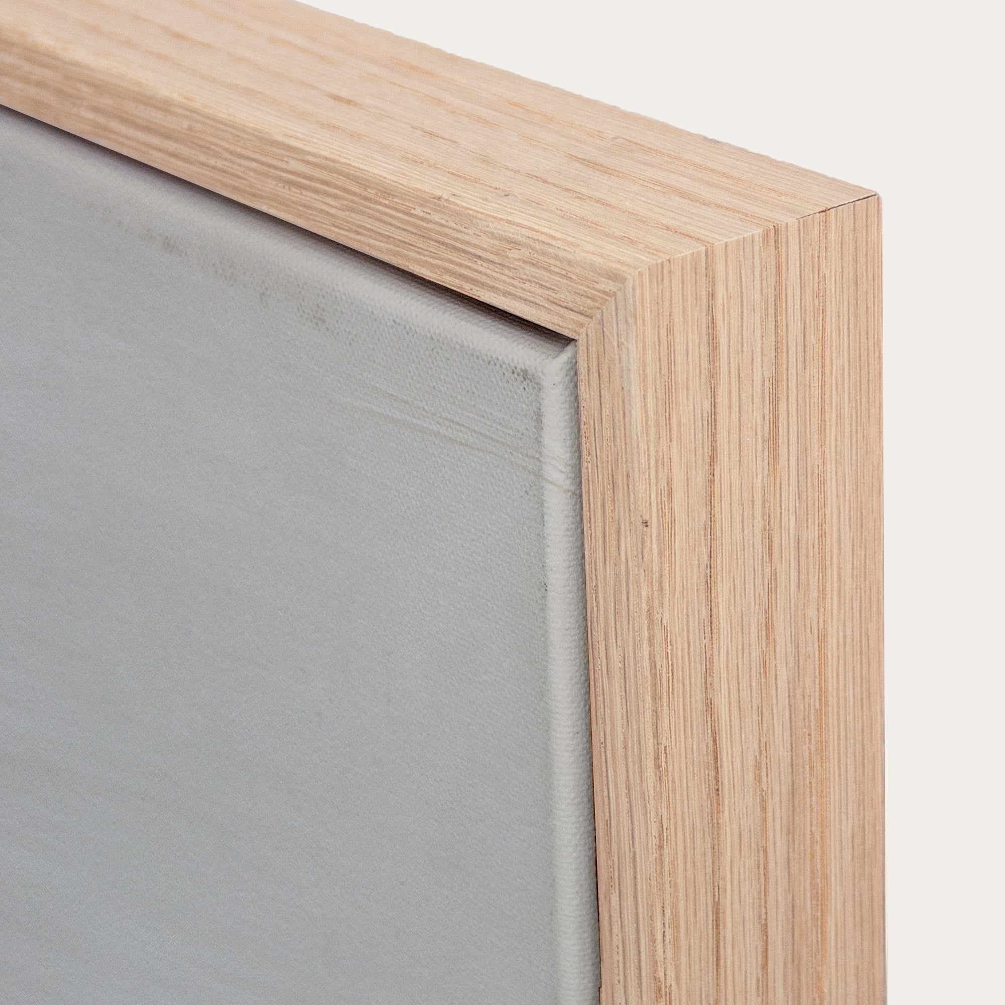 Close-up of a wooden frame with a gray interior 