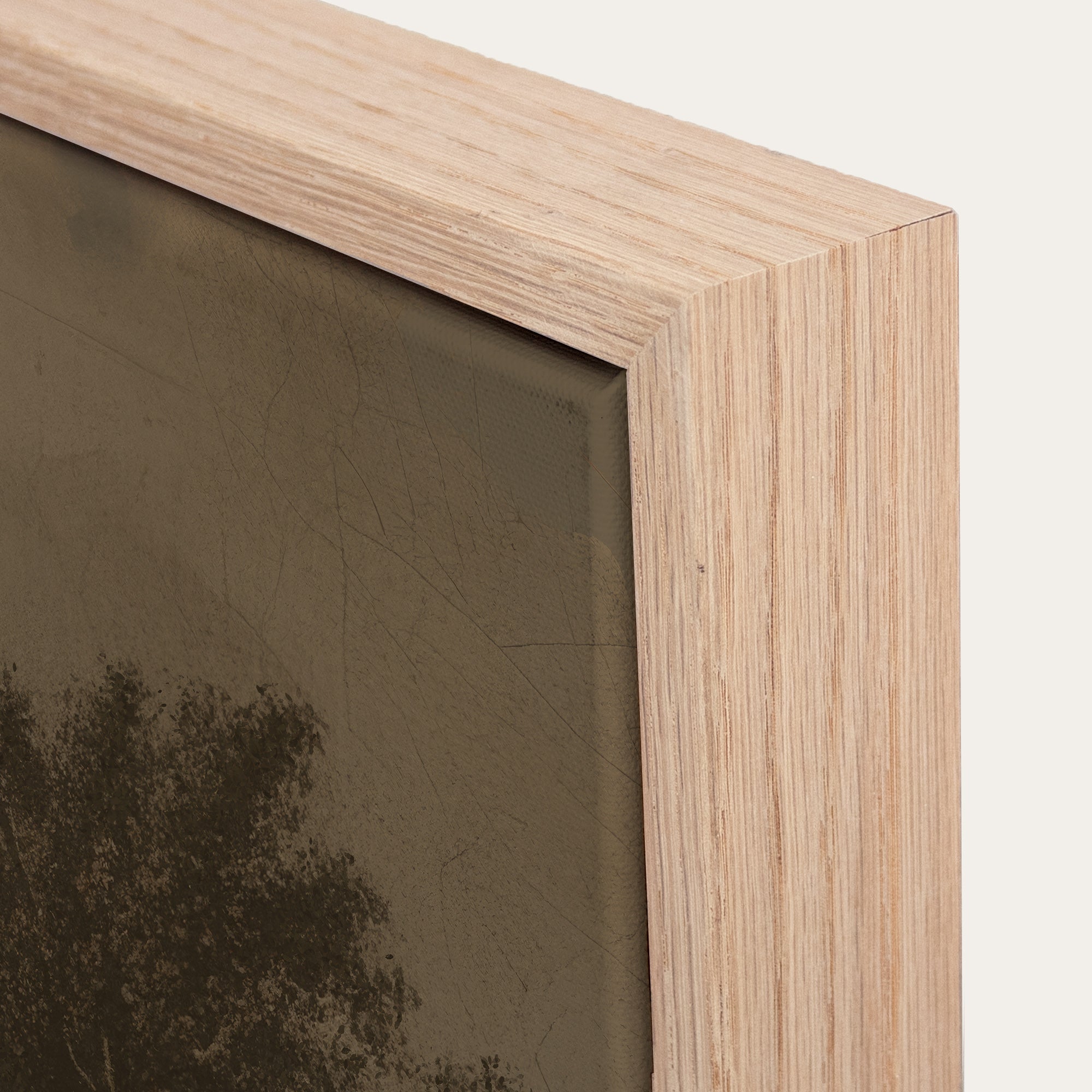 Close-up of a wooden picture frame with a blurred background 