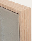 close-up of a wooden frame corner with a textured gray surface inside 