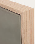 close-up of a wooden frame corner with a gray background 