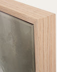 close-up of a wooden frame corner with a textured surface. 