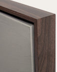 close-up of a wooden frame corner with a neutral background 