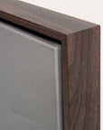 close-up of a wooden frame corner with a neutral background 