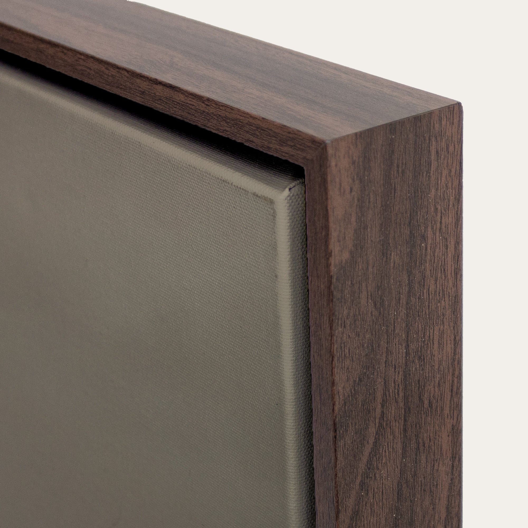 Close-up of a wooden frame corner on a mirror 