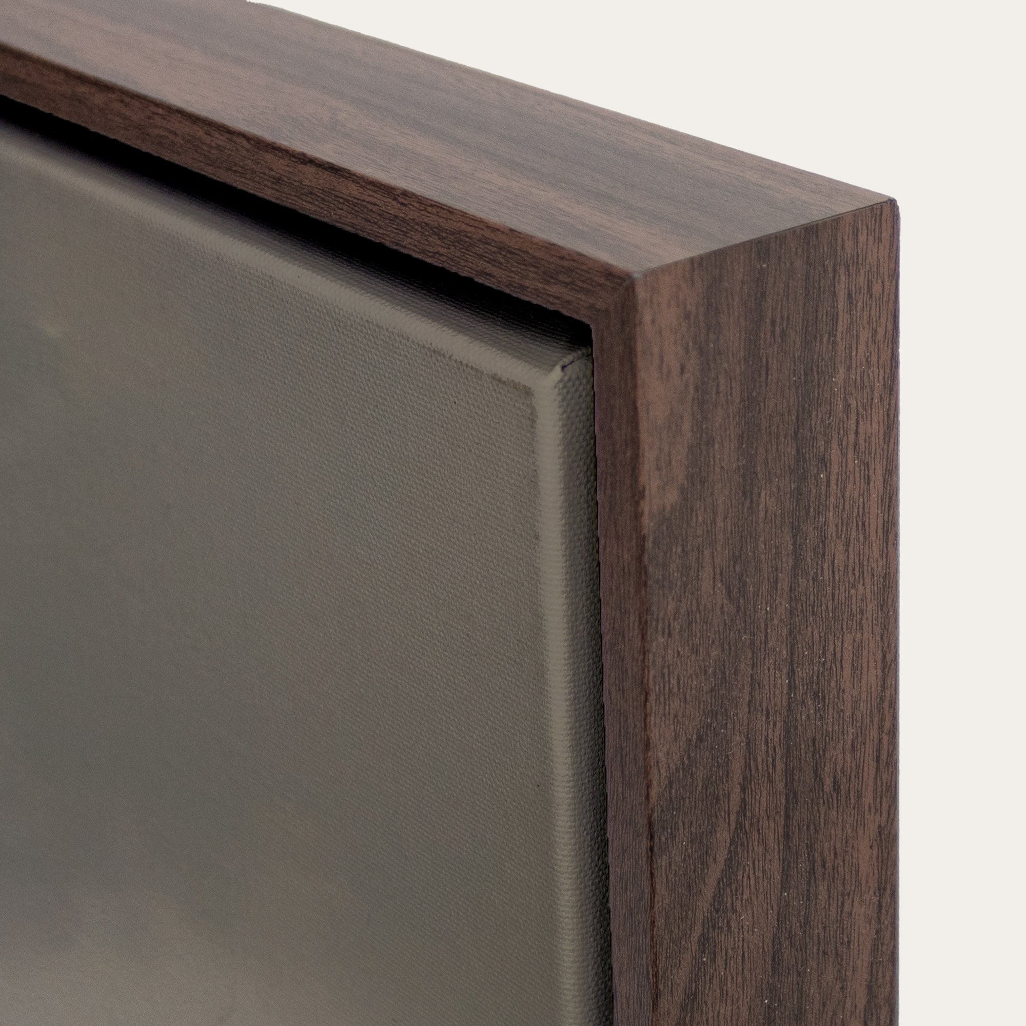Close-up of a wooden frame corner on a mirror 