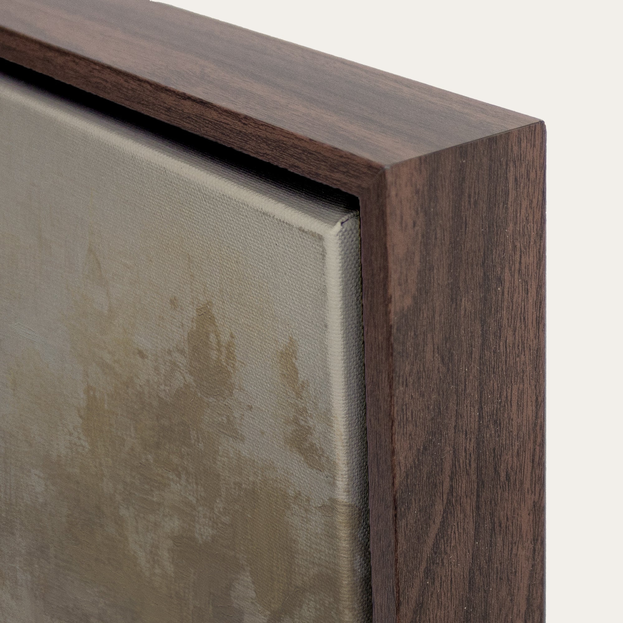 Close-up of a wooden frame corner with a textured surface. 