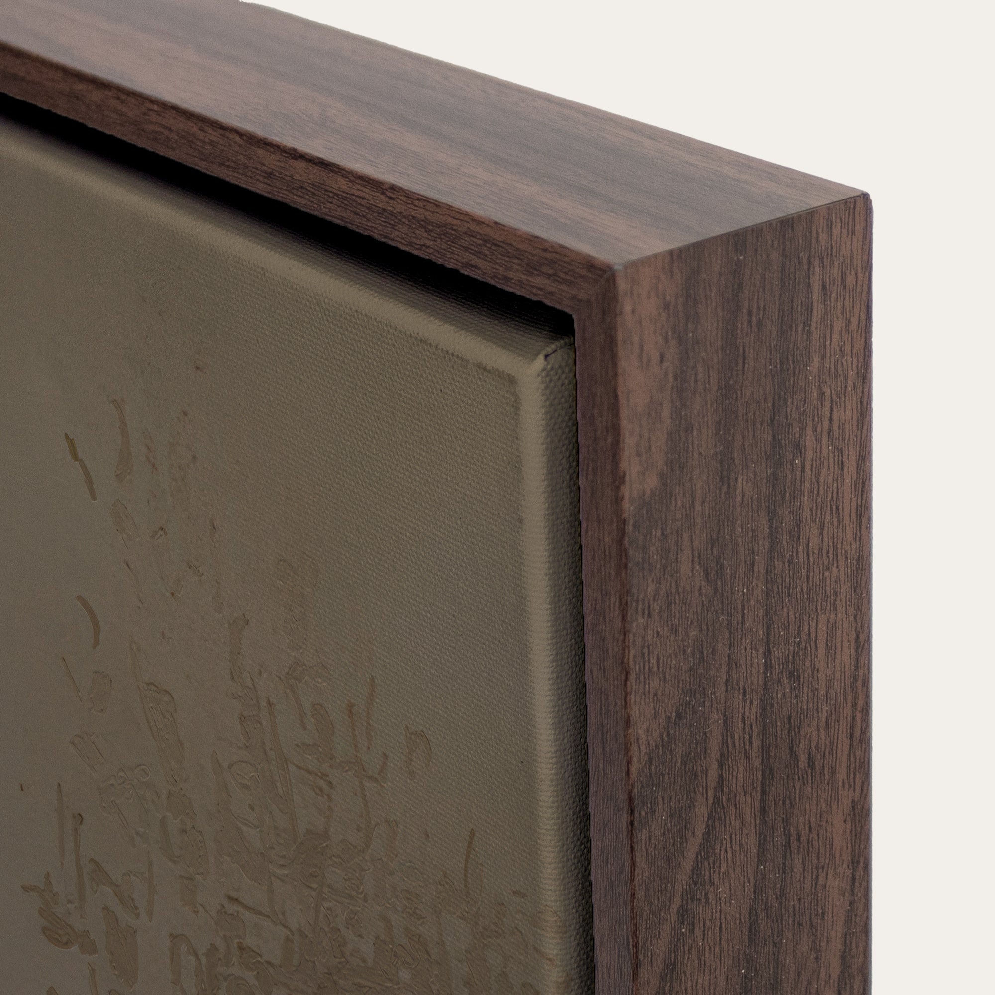 Close-up of a wooden frame corner with a textured surface 