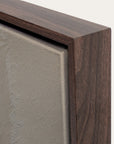 close-up of a wooden frame corner with a neutral background 