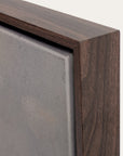 close-up of a wooden frame corner with a gray surface 