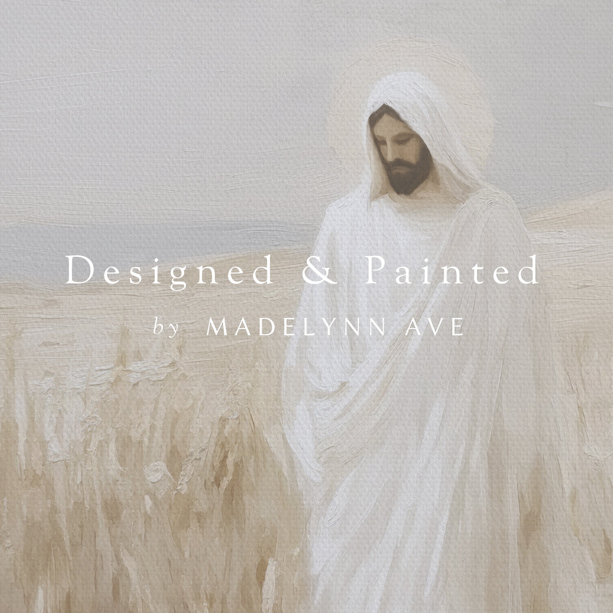 Person in a white robe standing in a field with 'Designed &amp; Painted by Madelynn Ave' text overlay.