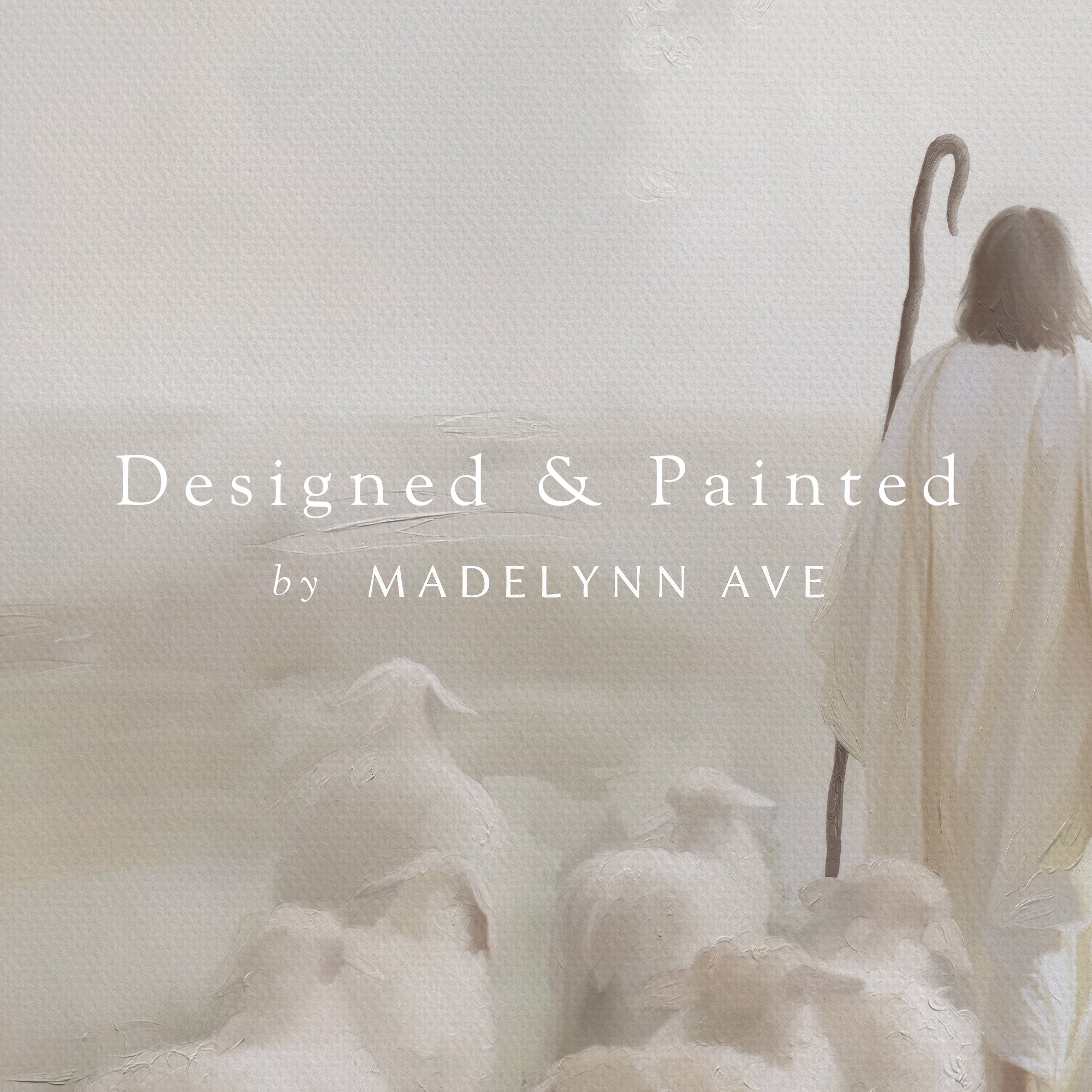 Shepherd with sheep in a misty landscape, with 'Designed &amp; Painted by Madelynn Ave' text overlay.