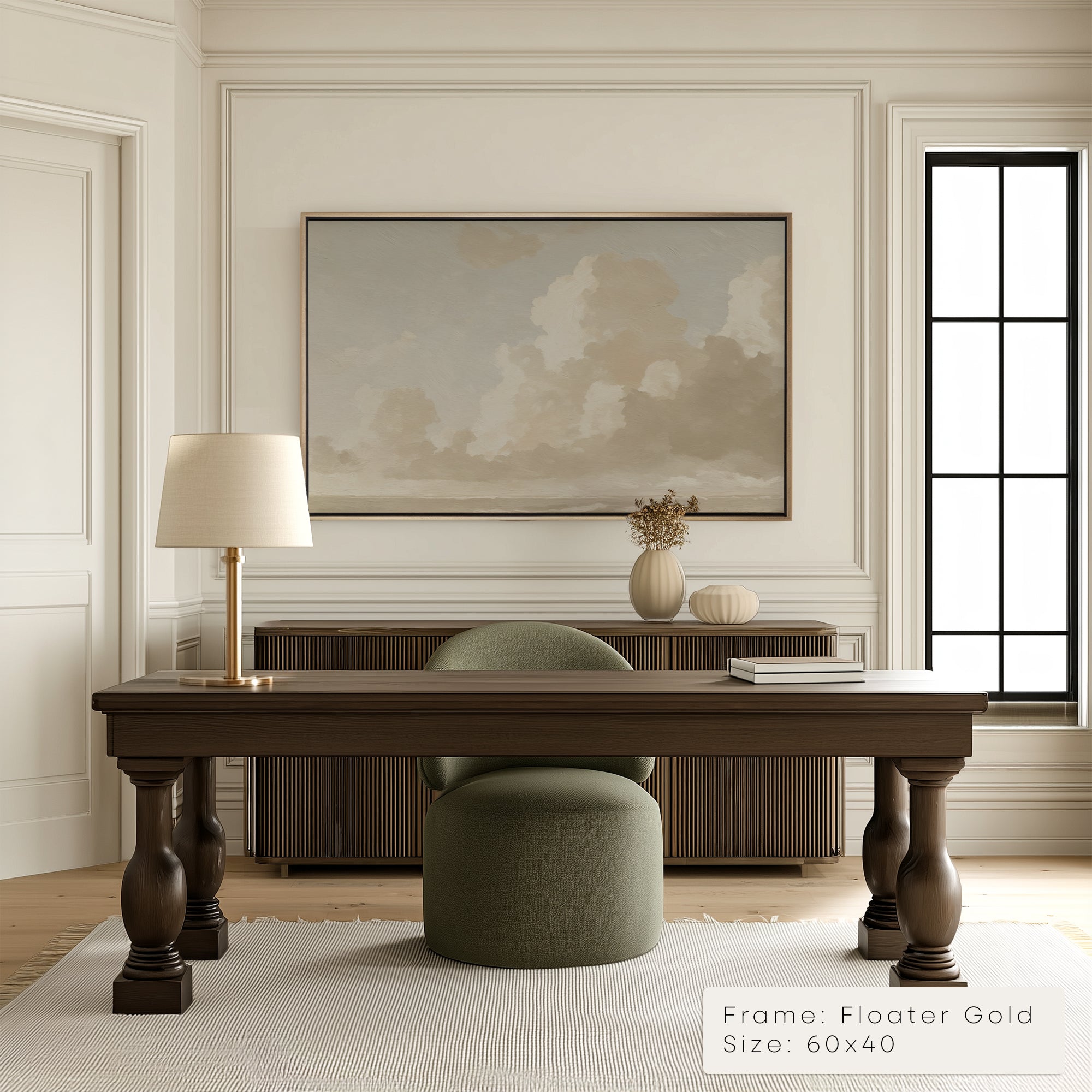 Modern office interior with a wooden desk, chair, and framed artwork on the wall.