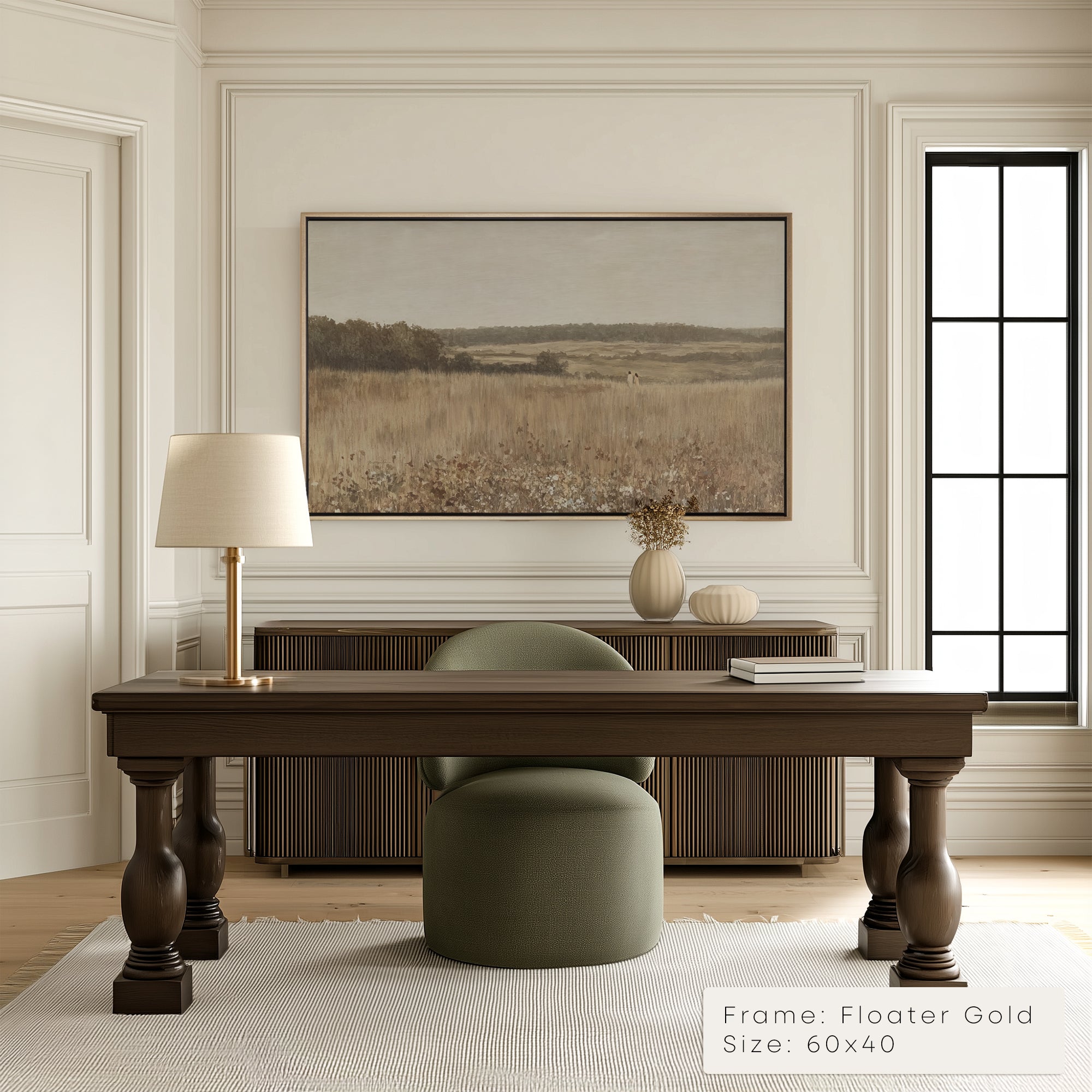 Modern office interior with a wooden desk, chair, and framed landscape art on the wall.