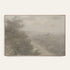 Forgotten Road art print in a light oak floater frame. A foggy road fades past a dark stand of trees in soft grays and warm stone tones, shown against a plain off-white wall. #Oak