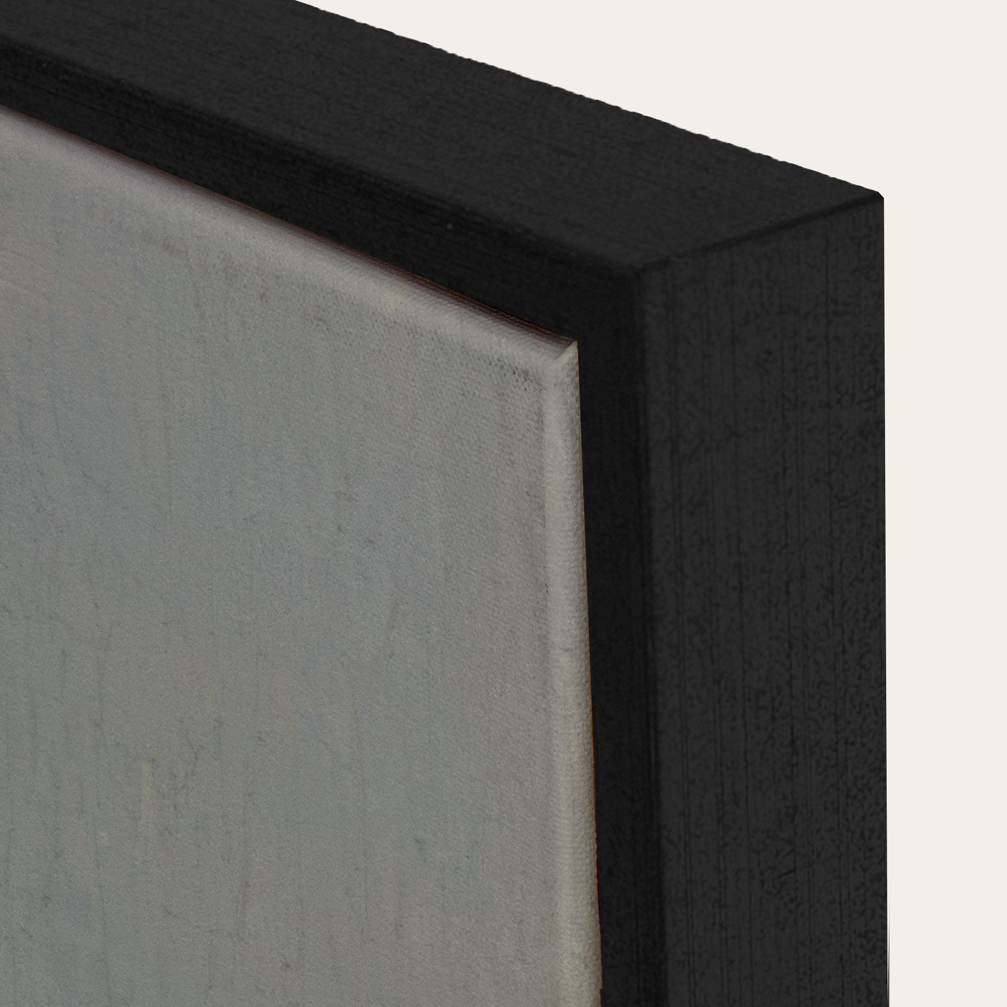 Close-up of a black frame corner with a gray background 