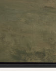 textured green painting with a signature at the bottom right corner 