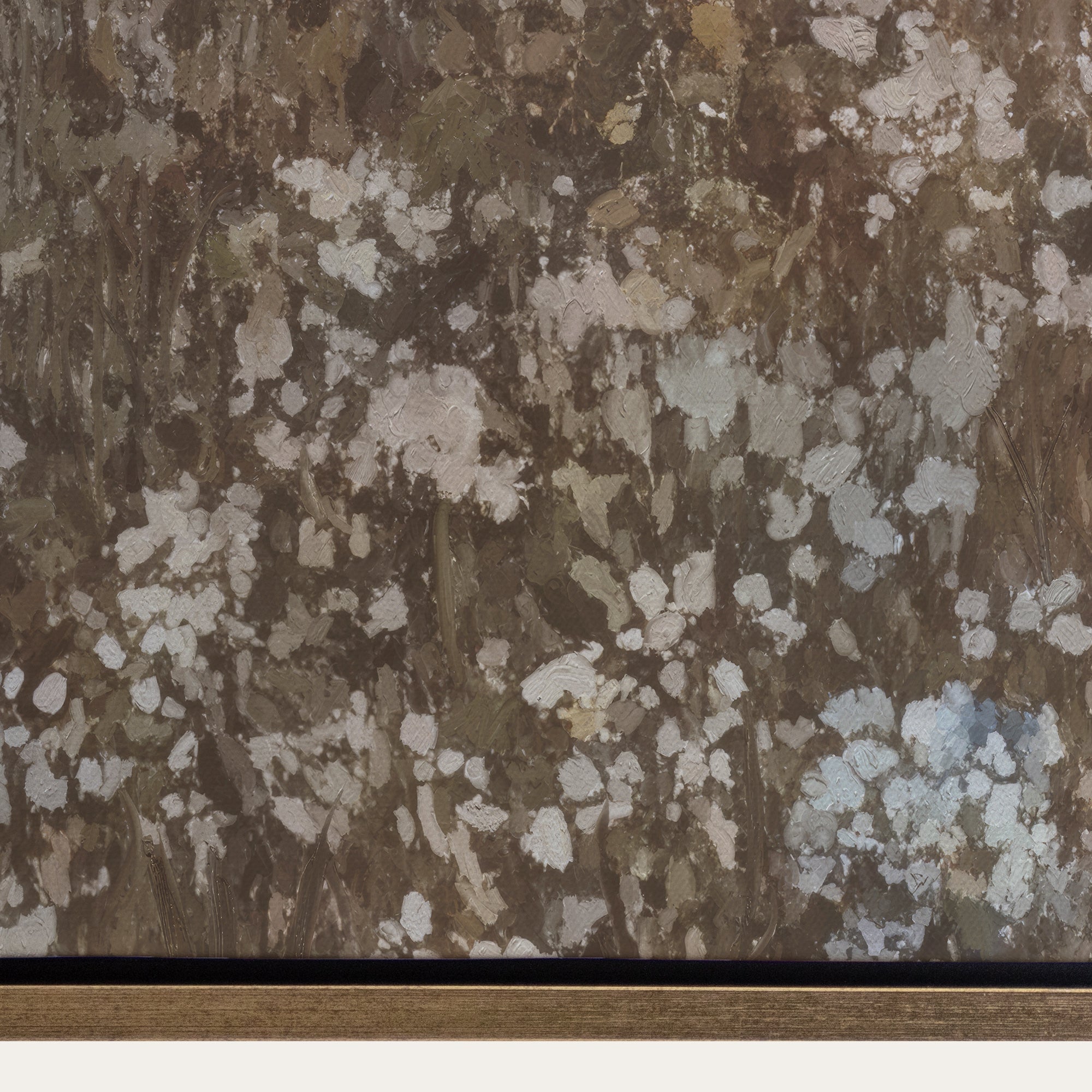 Textured brown and beige patterned wallpaper with a gold border 