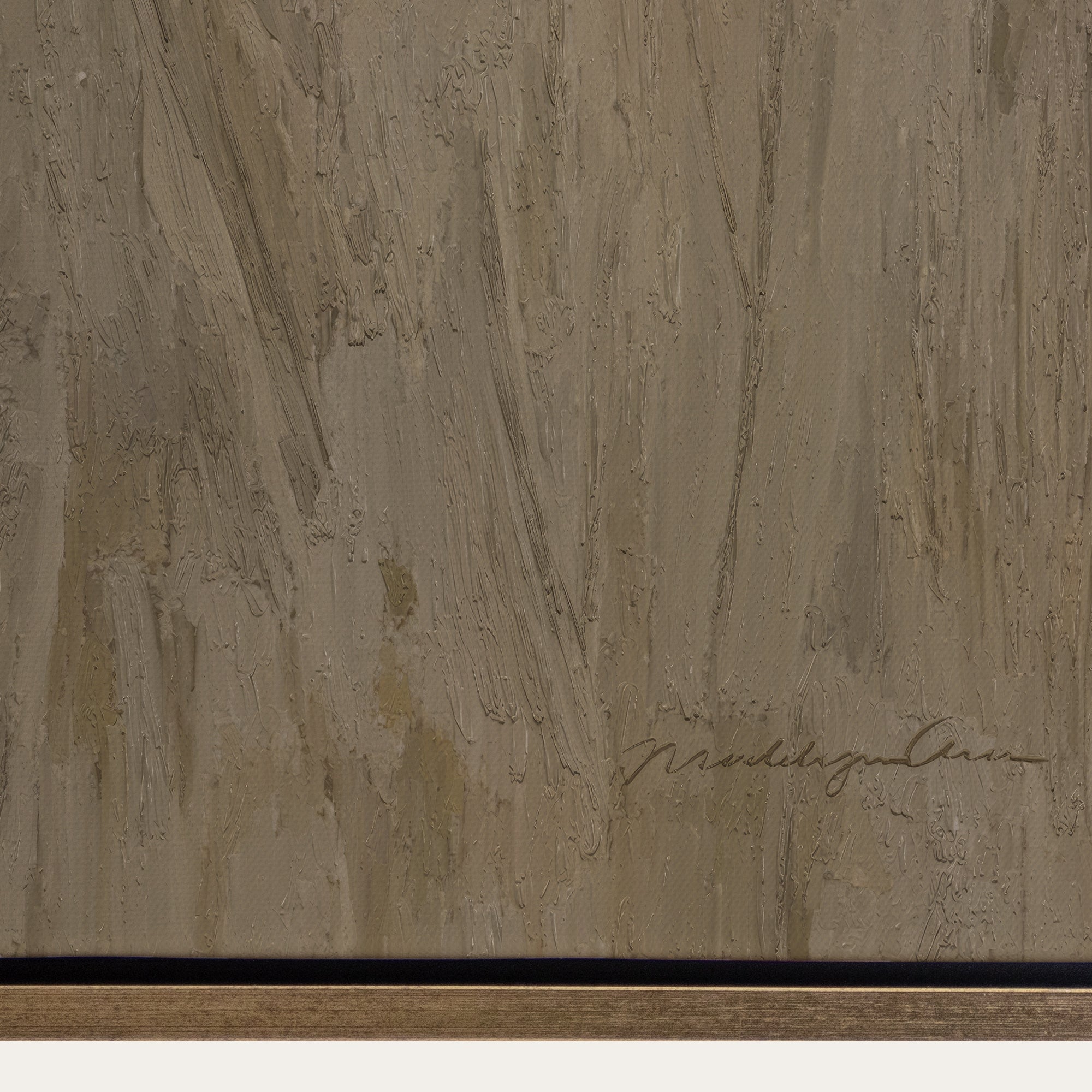 Textured brown surface with a signature at the bottom 