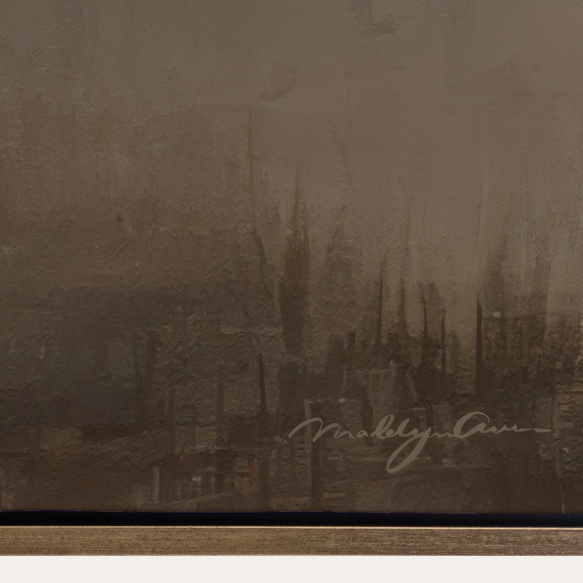 Vintage sepia-toned photograph of a cityscape with a signature at the bottom right corner. 
