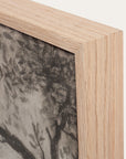 close-up of a wooden picture frame with a textured background 