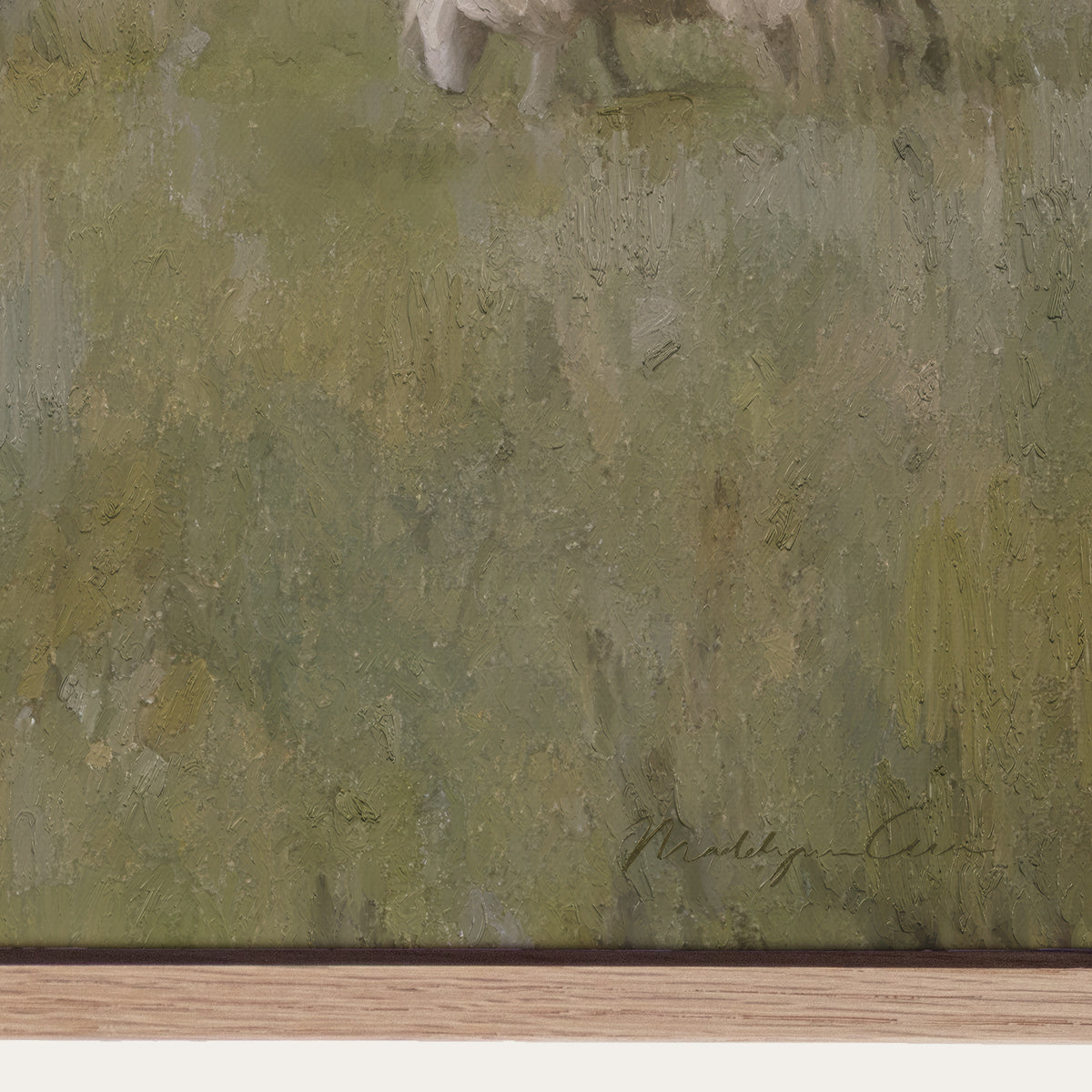 Close-up of a textured green painting with a signature at the bottom right corner. 