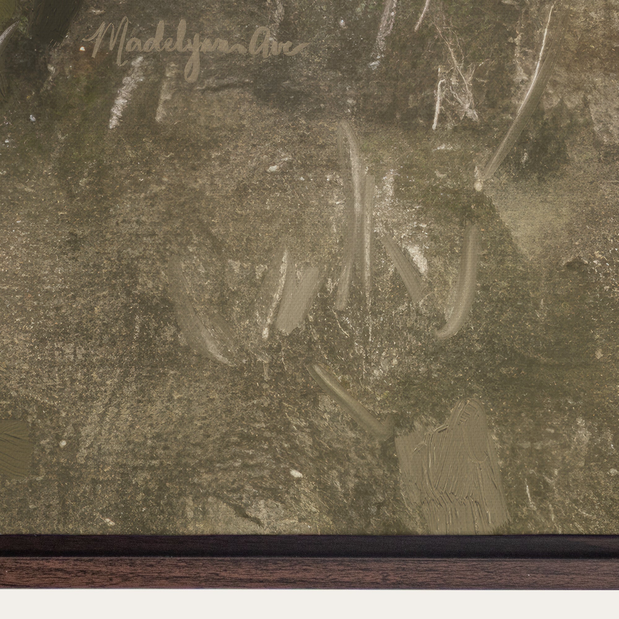 Close-up of a textured surface with 'Madelonette' branding. 
