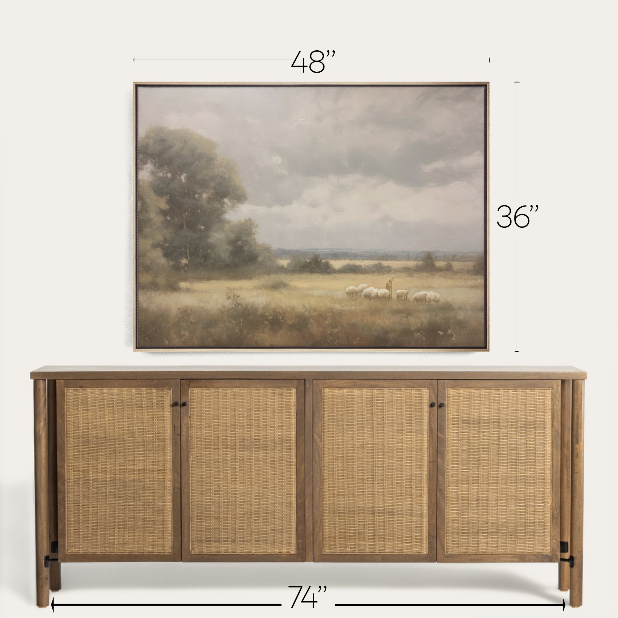 Wooden sideboard with wicker doors and framed landscape painting above it, showing dimensions. 