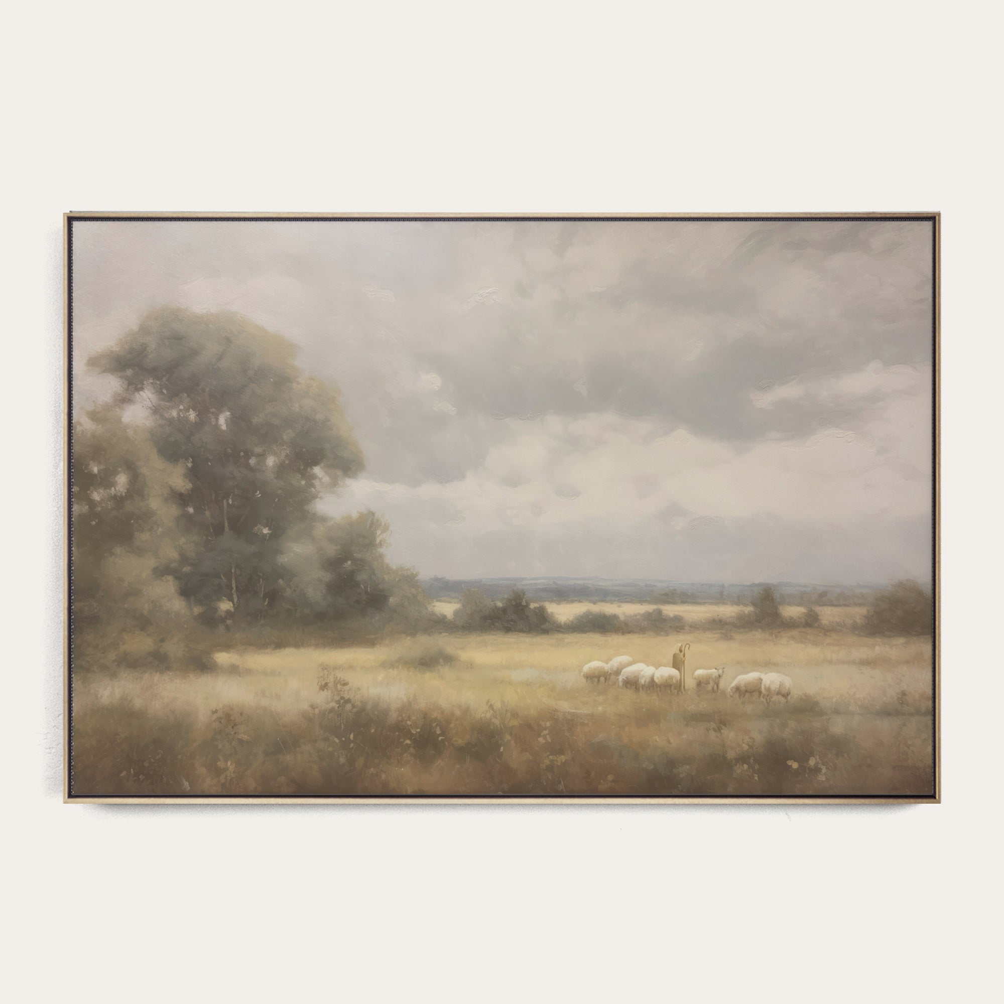 Framed landscape painting of a field with sheep and trees. 
