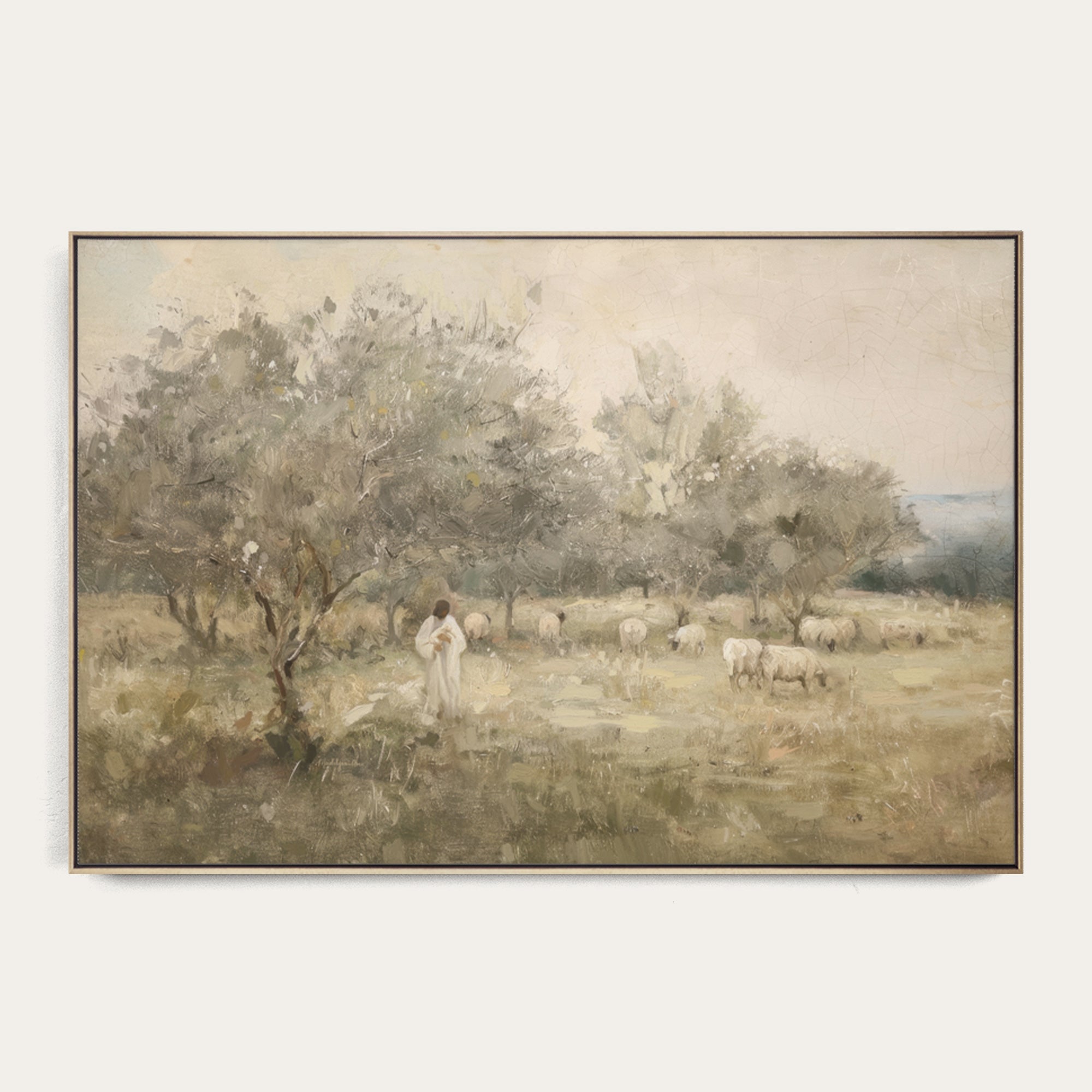Framed artwork of a pastoral scene with a shepherd and sheep in a field. 