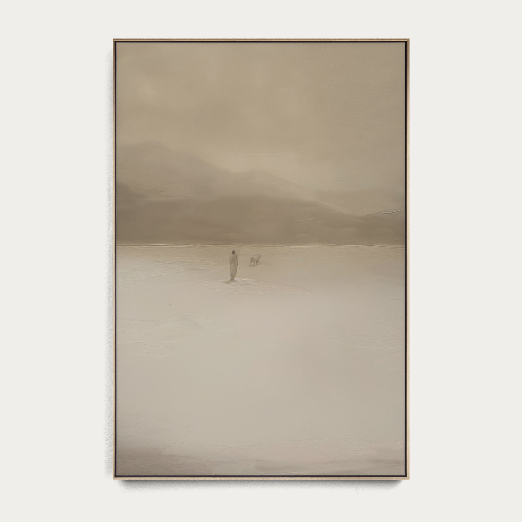 Framed artwork of a person standing in a vast, misty landscape with a neutral color palette. 